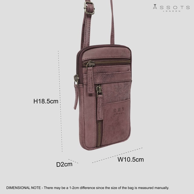 'BROOKE' Real Leather Mobile Phone Crossbody Bag Introducing 'Brooke', the perfect companion for the urban life. Beautifully handcrafted from real leather and with adjustable shoulder handles, its timeless finesse and multi-pocketed design is both elegant and practical, allowing you to move around with effortless grace. The ideal travel crossbody phone bag for everyday use.
One main zip pocket compartment to fit in your daily essentials. Two front zip pockets to slide in your house keys, car keys and more. Front slip pocket to slide in your cardholder. Full length zip pocket at the back to slide in your credit cards, membership cards and more. Adjustable leather shoulder handles for a comfortable carry. Fittings Colour: Antique Brass. Composition: Body: 100% Genuine Leather. Lining: Polyester Mix.
DISCLAIMER : All pictures shown are for illustration purpose only. Actual product colour may vary due to different ambience lighting or the screen display settings. Size- W10.5cm x H18.5cm x D2cm.