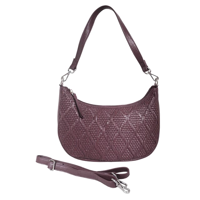 Indulge in luxury with the Assots Premium 'Wonder Weave' Real Leather Woven Designer Shoulder Crossbody Bag. Meticulously crafted with articulate weaving, this bag exudes sophistication and perfection. Its artisanal slot weave creates a unique sense of movement and texture, making it a versatile and luxurious everyday companion. Its versatile design allows it to be worn as a crossbody or shoulder bag, with detachable handles for convenience. Beautiful diamond shaped weaving with the finest full grain genuine leather. Detachable shoulder and crossbody handles to be worn as a crossbody bag or a shoulder bag. Lightweight. Secured zip closure opens to a fully lined and roomy compartment to accommodate all your essentials. Internal zip pocket for your smartphone, house keys and car keys. Available in 13 more elegant colours. Fittings Colour: Silver Nickel. Composition: Body: 100% Genuine Leather, Lining: Polyester. DISCLAIMER: All pictures shown are for illustration purpose only. Actual product colour may vary due to different ambience lighting or the screen display settings. Size- W29cm x H18cm x D8cm.