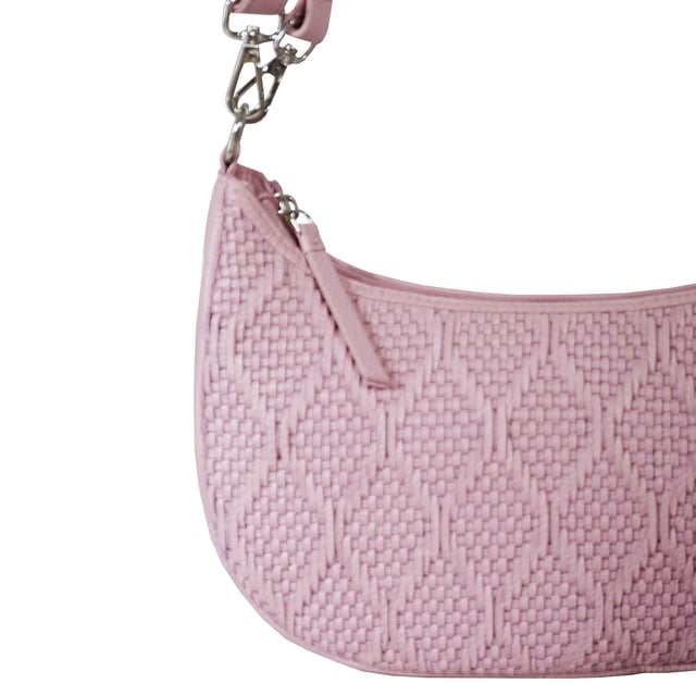 Indulge in luxury with the Assots Premium 'Wonder Weave' Real Leather Woven Designer Shoulder Crossbody Bag. Meticulously crafted with articulate weaving, this bag exudes sophistication and perfection. Its artisanal slot weave creates a unique sense of movement and texture, making it a versatile and luxurious everyday companion. Its versatile design allows it to be worn as a crossbody or shoulder bag, with detachable handles for convenience. Beautiful diamond shaped weaving with the finest full grain genuine leather. Detachable shoulder and crossbody handles to be worn as a crossbody bag or a shoulder bag. Lightweight. Secured zip closure opens to a fully lined and roomy compartment to accommodate all your essentials. Internal zip pocket for your smartphone, house keys and car keys. Available in 13 more elegant colours. Fittings Colour: Silver Nickel. Composition: Body: 100% Genuine Leather, Lining: Polyester. DISCLAIMER: All pictures shown are for illustration purpose only. Actual product colour may vary due to different ambience lighting or the screen display settings. Size- W29cm x H18cm x D8cm.