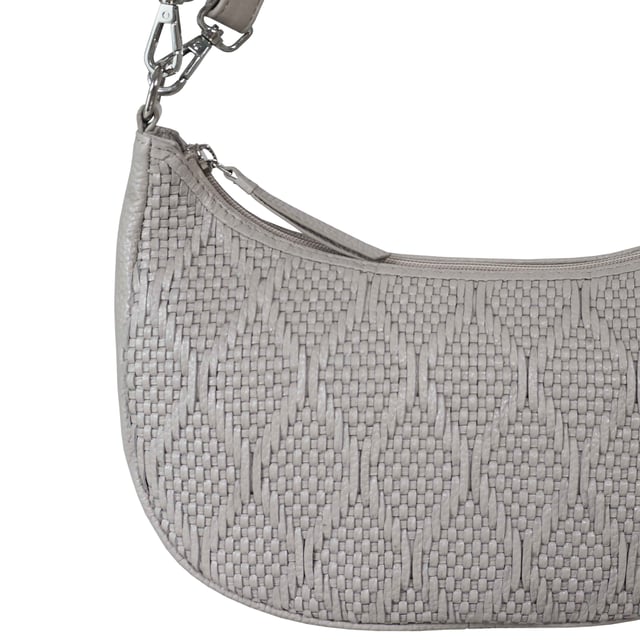 Indulge in luxury with the Assots Premium 'Wonder Weave' Real Leather Woven Designer Shoulder Crossbody Bag. Meticulously crafted with articulate weaving, this bag exudes sophistication and perfection. Its artisanal slot weave creates a unique sense of movement and texture, making it a versatile and luxurious everyday companion. Its versatile design allows it to be worn as a crossbody or shoulder bag, with detachable handles for convenience. Beautiful diamond shaped weaving with the finest full grain genuine leather. Detachable shoulder and crossbody handles to be worn as a crossbody bag or a shoulder bag. Lightweight. Secured zip closure opens to a fully lined and roomy compartment to accommodate all your essentials. Internal zip pocket for your smartphone, house keys and car keys. Available in 13 more elegant colours. Fittings Colour: Silver Nickel. Composition: Body: 100% Genuine Leather, Lining: Polyester. DISCLAIMER: All pictures shown are for illustration purpose only. Actual product colour may vary due to different ambience lighting or the screen display settings. Size- W29cm x H18cm x D8cm.