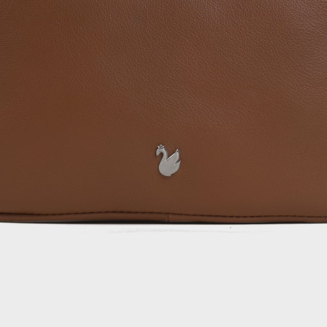 Redefine elegance with the ‘Avon’ soft Nappa leather crossbody bag, a perfect fusion of luxury, craftsmanship, and practicality. Expertly handcrafted from the finest full-grain soft Nappa leather, this premium bag is designed for those who appreciate timeless sophistication and effortless style. Whether you're heading to work, a casual outing, or an evening event, the ‘Avon’ crossbody bag is your go-to accessory for effortless sophistication and refined style. Premium Full-Grain Nappa Leather – Crafted from the softest and most supple genuine leather, offering a luxurious touch and exceptional durability. Smart & Functional Design – Double zipped compartments for easy organisation and secure storage. Spacious interior to accommodate your daily essentials with ease. Adjustable Leather Shoulder Strap – Designed for custom comfort, allowing you to wear it as a crossbody or shoulder bag. Lightweight & Versatile – A perfect everyday companion, seamlessly blending style and functionality. Signature Assots ‘Swan’ Collection – Embellished with the iconic ‘Swan’ logo, symbolising elegance, grace, and superior craftsmanship. Additional Internal Features - Slip-in pocket for your mobile phone, car keys and house keys. Fittings Colour: Silver. Composition: Body: 100% Genuine Leather, Lining: Polyester. Size: 14cm x 20cm x 7cm
