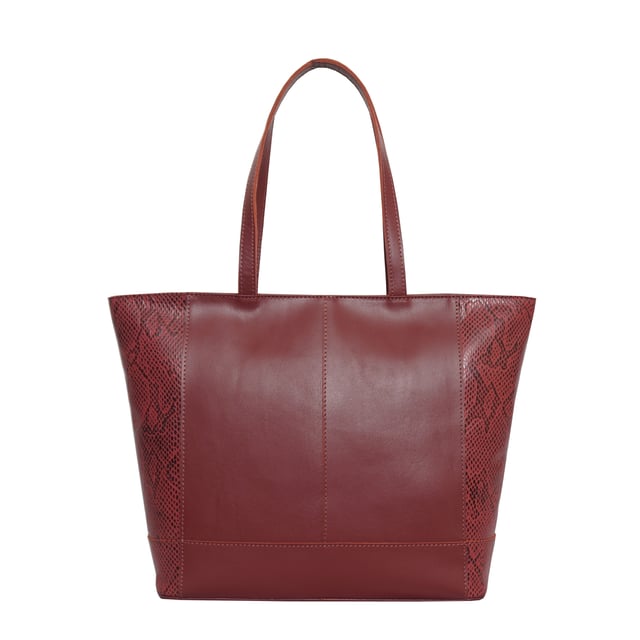 The ‘Klara’ large unlined tote bag is beautifully handcrafted with designer Animal Snake Print Leather on the sides and premium smooth leather on the front and back. It features a zip top closure for you to store your essentials safely and securely. This leather shopper is designed to ensure you don’t run out of space and have ample room for all your necessities when you’re out and about. Stand out with ‘Klara’, the perfect travel companion ideal for all occasions.
Secured zip top closure opens to a roomy unlined interior. Easily fits a 13-inch laptop. Double stitching on the handles for extra reinforcement and strength to avoid handle snapping. Reinforced base to avoid bulging when stuffed. Unlined natural leather shopper made to last a lifetime. Leather shoulder handle for easy pick up and go. Adorned with the inimitable Assots London brushed gold clean finish logo demonstrating it’s premium quality. Fittings colour: Antique Brass. Composition: Body: 100% Genuine Leather. Lining: Unlined.
DISCLAIMER : All pictures shown are for illustration purpose only. Actual product colour may vary due to different ambience lighting or the screen display settings. Size- W42.5cm x H29cm x D10.5cm.
