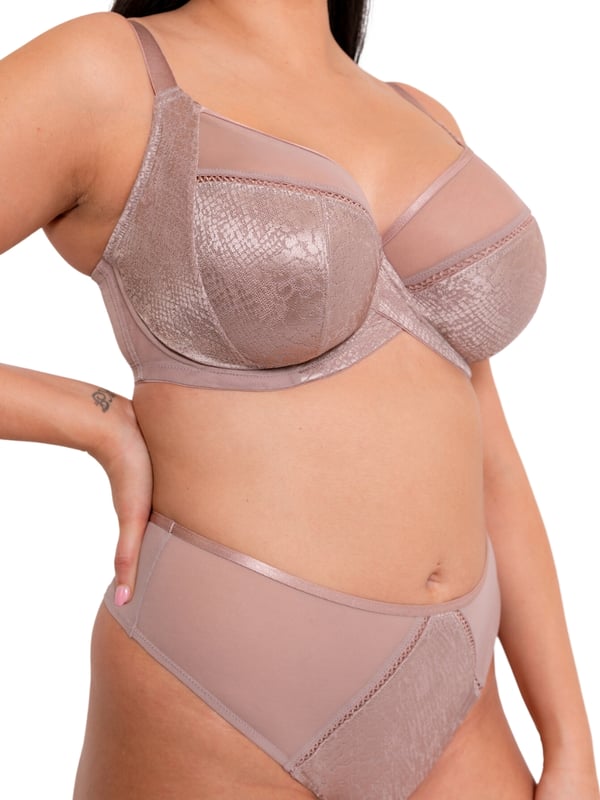 Curvy Kate Amaze Balcony Bra. With its shape based on the popular Curvy Kate Victory design this non padded balcony bra has a curved centre front and central pull strap position as well as a four section design for uplift and forward projection. The product is recommended for hand wash only.