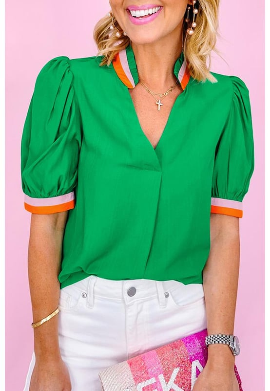 Bright green blouse with colorful trim
  V
  neck with collar detail
  Stylish puff sleeves with trim
  Versatile piece for both formal and casual occasions
  Relaxed fit
  Available in sizes S to XL
  Made of high
  quality material for comfort