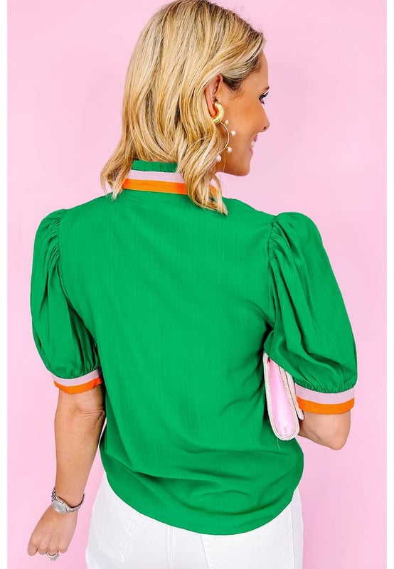 Bright green blouse with colorful trim
  V
  neck with collar detail
  Stylish puff sleeves with trim
  Versatile piece for both formal and casual occasions
  Relaxed fit
  Available in sizes S to XL
  Made of high
  quality material for comfort
