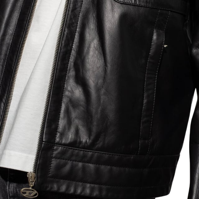 Schwarze Diesel-Lederjacke, zentraler Reißverschluss, 100 % Leder, Kragenkragen, 2 Reißverschlusstaschen auf der Brust, 2 offene Taschen, Diesel-Markenreißverschluss