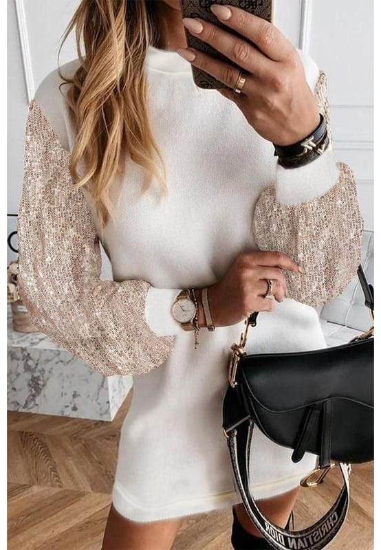 Premium quality fabric
  Sequin embellished design
  Round neckline
  Long puff sleeves
  Loose fit shift dress
  Falls above the knees
  Ideal for formal events and parties
Material: 90% Polyester 10% Elastane