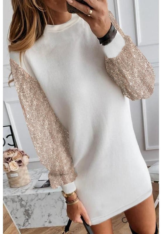 Premium quality fabric
  Sequin embellished design
  Round neckline
  Long puff sleeves
  Loose fit shift dress
  Falls above the knees
  Ideal for formal events and parties
Material: 90% Polyester 10% Elastane