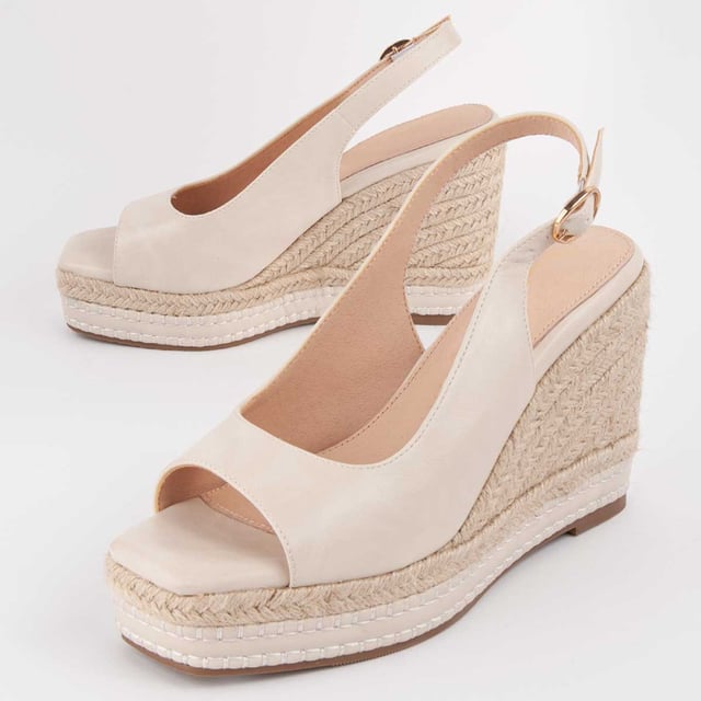 Espadrille-Sandale mit Keilabsatz für Damen. Innensohle aus 100% natürlichem Leder. Bequeme Passform. Hergestellt von anderen Marken für unsere Marke. Ungefährer Maße: 9 cm Keil und 3 cm Plateau.