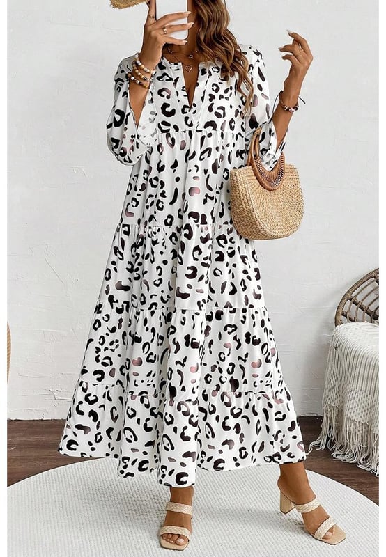 Classic white leopard print design
  Notch v neck
  Flared sleeves
  Flowy fit style
  Tiered design with maxi length
  Perfect for parties holidays and daily wear
  Refer to size chart for accurate sizing
Material: 100% Polyester