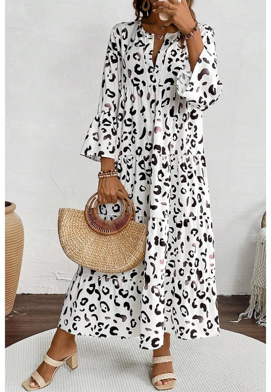Classic white leopard print design
  Notch v neck
  Flared sleeves
  Flowy fit style
  Tiered design with maxi length
  Perfect for parties holidays and daily wear
  Refer to size chart for accurate sizing
Material: 100% Polyester