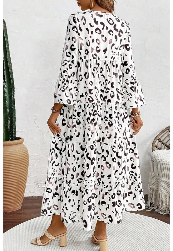 Classic white leopard print design
  Notch v neck
  Flared sleeves
  Flowy fit style
  Tiered design with maxi length
  Perfect for parties holidays and daily wear
  Refer to size chart for accurate sizing
Material: 100% Polyester