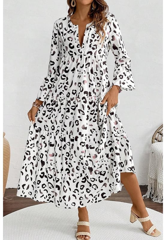 Classic white leopard print design
  Notch v neck
  Flared sleeves
  Flowy fit style
  Tiered design with maxi length
  Perfect for parties holidays and daily wear
  Refer to size chart for accurate sizing
Material: 100% Polyester