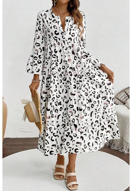Classic white leopard print design
  Notch v neck
  Flared sleeves
  Flowy fit style
  Tiered design with maxi length
  Perfect for parties holidays and daily wear
  Refer to size chart for accurate sizing
Material: 100% Polyester