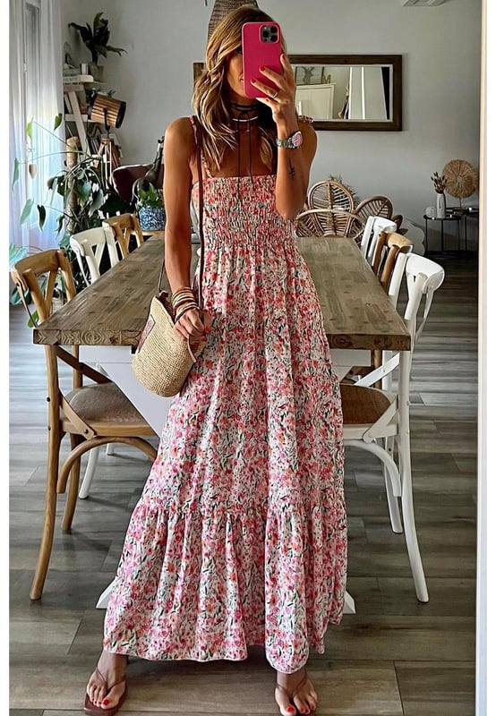 White Boho Floral Smocked Ruffled Maxi Dress
  Allover floral print for a chic boho touch
  Smocked bodice and flowy maxi silhouette for comfort
  Self
  tie straps for added style
  Perfect for traveling and taking photos
  Available in sizes S
  XL
Material: 100% Polyester