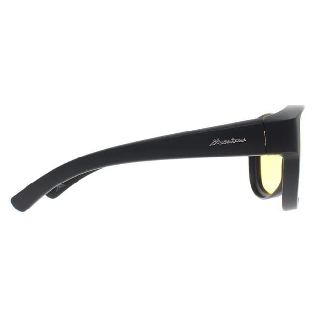 The FO6 Fit-Over Sunglasses by Montana Eyewear provide a practical solution for those who wear prescription glasses. The lightweight matte black polycarbonate frame ensures a secure and comfortable fit without adding extra bulk. Featuring polarized Cat. 1 yellow lenses, these sunglasses help reduce glare and improve contrast in low-light conditions. This makes them a useful choice for night-time driving, as they brighten the view and enhance visibility in fog, rain, and dusk. With a lens width of 64 mm, a bridge width of 15 mm, and a temple length of 140 mm, they offer a well-balanced fit. A hard case and soft pouch are included for easy storage and protection.