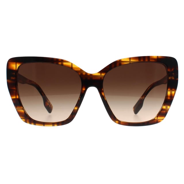 Las gafas de sol Burberry Cat Eye Womens Check on Striped Brown Gradient BE4366 Tamsin son un elegante diseño cat eye para cualquiera que desee elevar su look. Estas gafas de sol presentan una montura atrevida con una gruesa construcción de acetato que añade durabilidad y comodidad. El logotipo de Burberry se incorpora sutilmente en las patillas, añadiendo un toque de lujo al diseño.