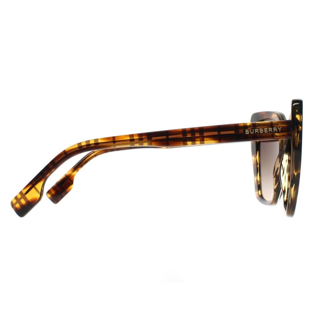 Las gafas de sol Burberry Cat Eye Womens Check on Striped Brown Gradient BE4366 Tamsin son un elegante diseño cat eye para cualquiera que desee elevar su look. Estas gafas de sol presentan una montura atrevida con una gruesa construcción de acetato que añade durabilidad y comodidad. El logotipo de Burberry se incorpora sutilmente en las patillas, añadiendo un toque de lujo al diseño.
