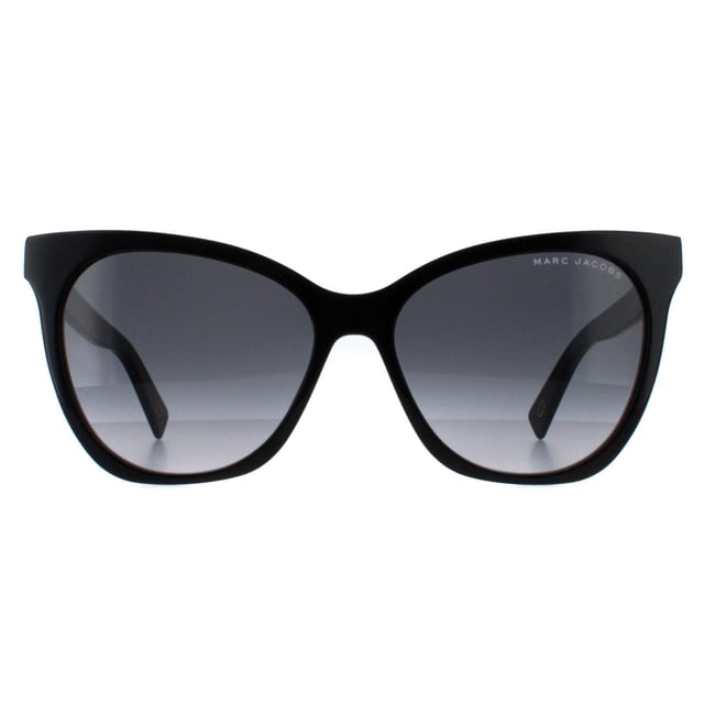 Marc Jacobs Cat Eye Womens Black Dark Grey Gradient MARC 336/S  Sunglasses offer a sophisticated and stylish look, perfect for those who appreciate modern design with timeless appeal. Crafted from premium materials, these full-rim sunglasses feature a sleek cat eye frame that complements various face shapes. The lenses provide superb UV protection, ensuring optimal eye safety in bright conditions. With subtle logo detailing on the temples, these  sunglasses combine fashion-forward aesthetics with everyday functionality, making them an ideal accessory for both casual and more polished occasions. Durable yet lightweight, they deliver all-day comfort and chic versatility.