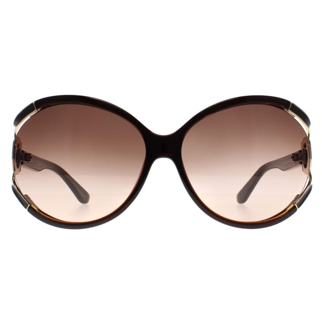 Salvatore Ferragamo Round Womens Dark Brown  Brown Grey Gradient SF600S  Sunglasses feature a contemporary design with a chic frame. Combining style and comfort, these sunglasses provide superior UV protection for any occasion.