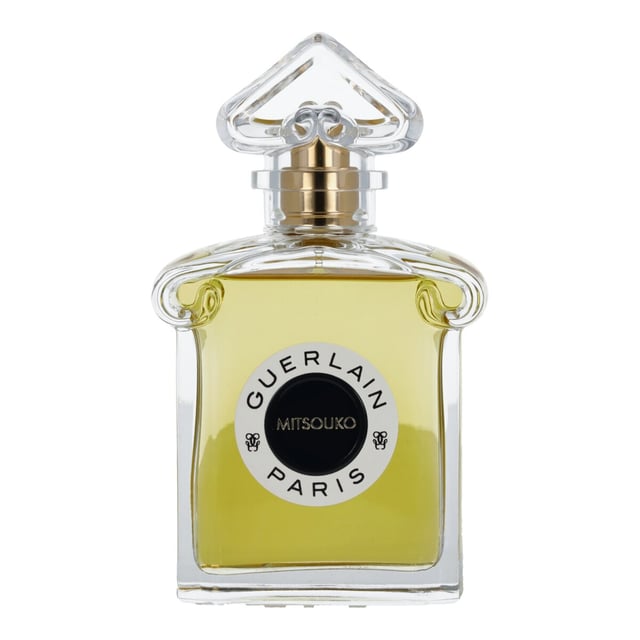 Discover the enchanting Guerlain Mitsouko Eau de Parfum Spray, a luxurious fragrance that has captivated hearts for over a century. This exquisite chypre and fruity scent features a harmonious blend of succulent peach and elegant floral notes of rose and jasmine. The fragrance's depth is enhanced by a tantalizing base of spicy underbrush and vetiver, making it a true olfactory masterpiece. Elevate your fragrance collection with Mitsouko, a timeless symbol of sophistication and allure.
