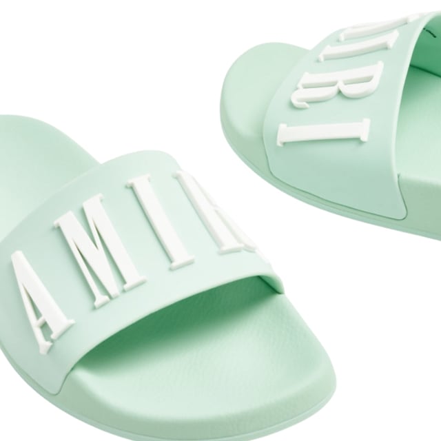 Elevate your style with Amiri sliders. Show off your fashion-forward taste and add a touch of luxury to your casual look. Perfect for any occasion, these slides will make a statement wherever you go. Upgrade your footwear game now!, Brand Logo, Perfect For The PoolSide, Pool Side Slider Sandal Sliders, Rubber Slides, Made in China, Sage Green Footwear