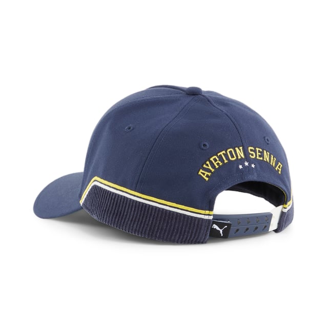 PRODUCT STORY: Explore the story of Ayrton Senna with the SENNA A VIDA cap. This iconic piece is a tribute to the life of the legendary Formula 1® driver, celebrating his passion for racing and the legacy he left behind as one of the best drivers in history. It has a 5-panel design and features AYRTON SENNA embroideries. FEATURES & BENEFITS: Made with at least 50% recycled materials. DETAILS: Curved brim; Snapback closure; 5-panel cap; AYRTON SENNA embroidered graphics; PUMA branding details.