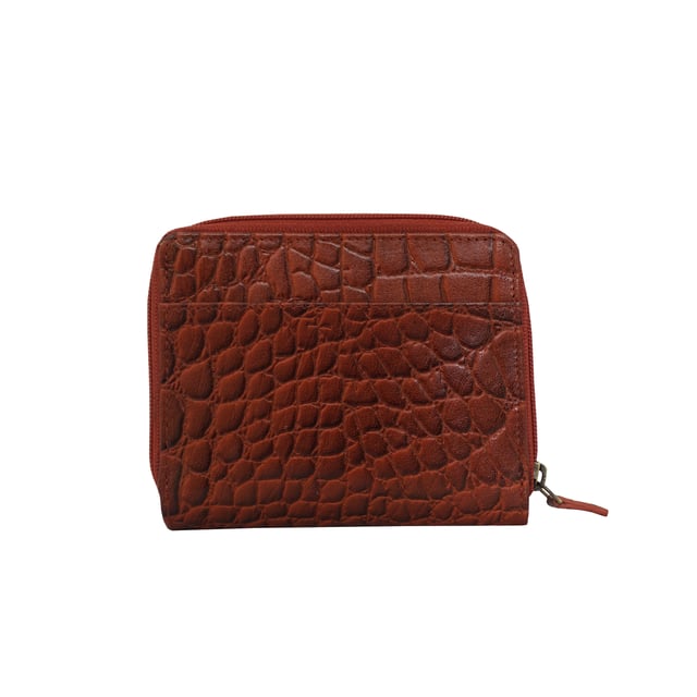 The 'Jolly' compact RFID equipped wallet purse is perfectly handcrafted with premium vintage Croc real leather for that designer look. This timeless design wallet purse easily fits in your bag or pocket featuring multiple card slots, slip pockets and a zip pocket. Organise your belongings with ease with 'Jolly' the perfect medium sized wallet purse.
Riveted closure for safe and secure storage. Zip compartment for you to store your coins and keys. Equipped with RFID technology to keep you safe from modern theft. Three card slots and three slip pockets for you to store your cards and notes. Compact size fitting easily in your bag or pocket. Fittings: Clean Brass. Composition: Body: 100% Genuine Leather. Lining: Polyester.
DISCLAIMER : All pictures shown are for illustration purpose only. Actual product colour may vary due to different ambience lighting or the screen display settings. Size- W11cm x H9.5cm x D2cm.