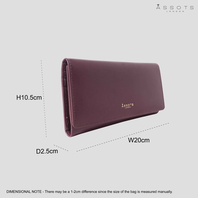 The ‘Claire’ flapover ladies purse is handcrafted with the Assots premium 'Giovani' Italian Polished vegetable tanned leather. Equipped with RFID technology, this practical ladies purse features a magnetic fastening closure with plenty of room to organise your cash, cards and coins. This large leather ladies purse is perfect to compliment your handbag and fits in easily. Stay safe and organised with ‘Claire’ the perfect addition to your collection of purses ideal for all outfits and occasions. Secured flap over magnetic fastening closure to store your essentials safely and securely. Foldover flap design. Equipped with RFID technology for safety. Additional back zip pocket to ensure you don’t run out of space. Two note compartments. Eight internal card compartments. Two windowed ID slots.Assots branded lined interiors. Lightweight for easy carry. Fittings Colour: Clean Brass. Composition: Body: 100% Genuine Leather. Lining: 100% Cotton. DISCLAIMER : All pictures shown are for illustration purpose only. Actual product colour may vary due to different ambience lighting or the screen display settings. Size - W20cm x H10.5cm x D2.5cm.