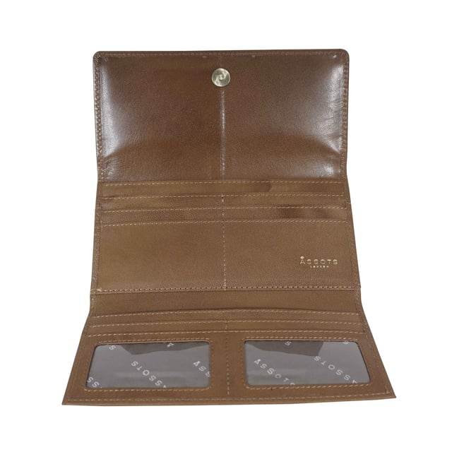 The ‘Claire’ flapover ladies purse is handcrafted with the Assots premium 'Giovani' Italian Polished vegetable tanned leather. Equipped with RFID technology, this practical ladies purse features a magnetic fastening closure with plenty of room to organise your cash, cards and coins. This large leather ladies purse is perfect to compliment your handbag and fits in easily. Stay safe and organised with ‘Claire’ the perfect addition to your collection of purses ideal for all outfits and occasions.
Secured flap over magnetic fastening closure to store your essentials safely and securely. Foldover flap design. Equipped with RFID technology for safety.
Additional back zip pocket to ensure you don’t run out of space. Two note compartments. Eight internal card compartments. Two windowed ID slots.Assots branded lined interiors. Lightweight for easy carry. Fittings Colour: Clean Brass. Composition: Body: 100% Genuine Leather. Lining: 100% Cotton.
DISCLAIMER : All pictures shown are for illustration purpose only. Actual product colour may vary due to different ambience lighting or the screen display settings. Size - W20cm x H10.5cm x D2.5cm.