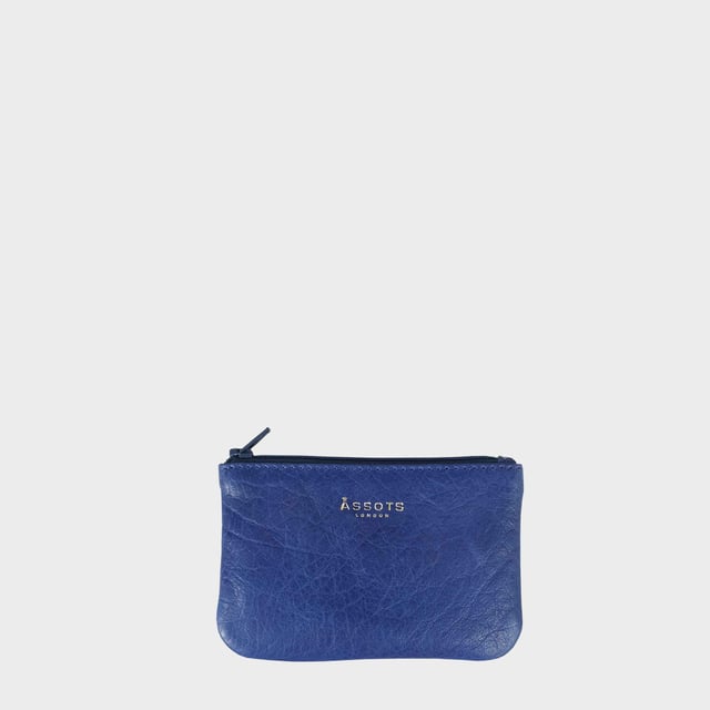 Assots 'Poppy' is a cute mini leather accessory handcrafted to compliment your collection of genuine leather handbags. Its simple and compact design is what makes this leather coin purse super practical and purposeful. Whether you prefer to carry one in lieu of a purse or keep one filled with change tucked inside your handbag, these pretty little things come in assorted colours.
Develops a unique rich patina with use to cherish over the years to come. Secured zip top closure. Embellished with an Assots London golden foil logo in the front. Opens to a fully lined interior in matching colour. Composition: Body: 100% Genuine Leather. Lining: Polyester.
DISCLAIMER : All pictures shown are for illustration purpose only. Actual product colour may vary due to different ambience lighting or the screen display settings. Size- W12cm x H8.5cm x D1cm.