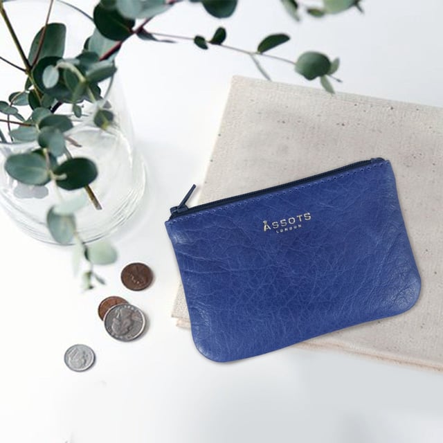 Assots 'Poppy' is a cute mini leather accessory handcrafted to compliment your collection of genuine leather handbags. Its simple and compact design is what makes this leather coin purse super practical and purposeful. Whether you prefer to carry one in lieu of a purse or keep one filled with change tucked inside your handbag, these pretty little things come in assorted colours.
Develops a unique rich patina with use to cherish over the years to come. Secured zip top closure. Embellished with an Assots London golden foil logo in the front. Opens to a fully lined interior in matching colour. Composition: Body: 100% Genuine Leather. Lining: Polyester.
DISCLAIMER : All pictures shown are for illustration purpose only. Actual product colour may vary due to different ambience lighting or the screen display settings. Size- W12cm x H8.5cm x D1cm.