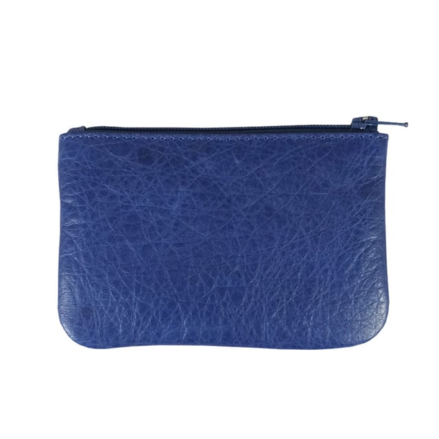 Assots 'Poppy' is a cute mini leather accessory handcrafted to compliment your collection of genuine leather handbags. Its simple and compact design is what makes this leather coin purse super practical and purposeful. Whether you prefer to carry one in lieu of a purse or keep one filled with change tucked inside your handbag, these pretty little things come in assorted colours.
Develops a unique rich patina with use to cherish over the years to come. Secured zip top closure. Embellished with an Assots London golden foil logo in the front. Opens to a fully lined interior in matching colour. Composition: Body: 100% Genuine Leather. Lining: Polyester.
DISCLAIMER : All pictures shown are for illustration purpose only. Actual product colour may vary due to different ambience lighting or the screen display settings. Size- W12cm x H8.5cm x D1cm.