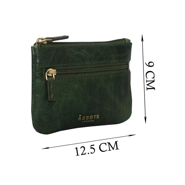 Keep things simple with this small coin purse crafted from super soft and supple natural grain Nappa leather. Featuring a simple compartment that opens along the top, the 'Mary' has a fully lined matching interior that is ideal for the basics. Comes in four more bright colours to spot easily in your bag.
Zip top closure. Zip pocket at the front. Embellished with gold metal zippers and an inimitable Assots London golden foil embossed logo. Fittings: Gold 
Composition: Body: 100% Genuine Leather. Lining: 100% Polyester.
DISCLAIMER : All pictures shown are for illustration purpose only. Actual product colour may vary due to different ambience lighting or the screen display settings. Size- W12.5cm x H9cm.