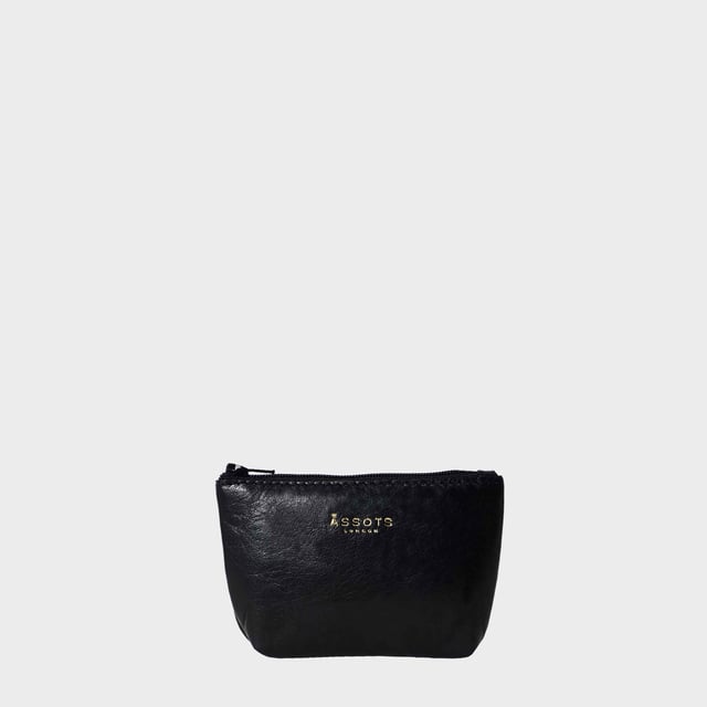 'Diana' Full Grain Leather Zip Top Coin Purse Assots 'Diana' is a cute mini leather accessory handcrafted to compliment your collection of genuine leather handbags. Its simple, compact and t-gusset design is what makes this leather coin purse super practical and purposeful. Whether you prefer to carry one in lieu of a purse or keep one filled with change tucked inside your handbag, these pretty little things come in assorted colours.
Develops a unique rich patina with use to cherish over the years to come. Secured zip top closure. T-gusset design provides extra space. Embellished with an Assots London golden foil logo in the front. Opens to a fully lined interior in matching colour. Composition: Body: 100% Genuine Leather. Lining: Polyester.
DISCLAIMER : All pictures shown are for illustration purpose only. Actual product colour may vary due to different ambience lighting or the screen display settings. Size- W13cm x H8.5cm x D2cm.