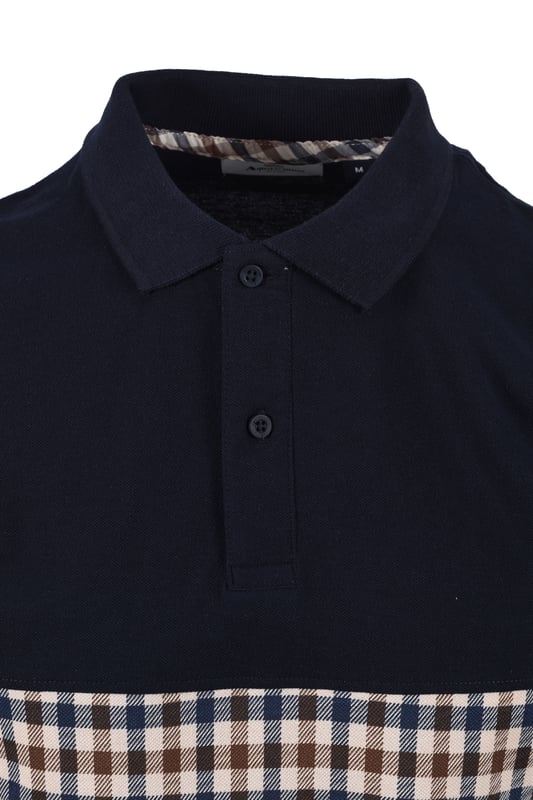 Aquascutum Iconic Insert Polo in Navy
Elevate your casual wardrobe with the timeless elegance of the Aquascutum Iconic Club Check Insert Polo Shirt in classic navy. This premium polo is crafted from luxuriously soft, organic pique cotton, ensuring comfort and a refined aesthetic.   
 
This polo offers a smart, structured fit, featuring a traditional ribbed collar and cuffs. The clean, two-button placket adds a touch of classic detail, while the iconic Aquascutum Club Check panel provides a signature touch of heritage style. A subtly woven brand tab completes the look, signifying the quality and craftsmanship synonymous with Aquascutum.
 
Features

Iconic Club Check Panel: A distinctive Aquascutum design element. 
Premium Pique Organic Cotton: Crafted from 100% cotton for superior comfort and breathability.   
Ribbed Collar & Cuffs: Provides a refined and structured finish.   
Two-Button Placket: Classic polo shirt detailing.   
Woven Brand Tab: A mark of authentic Aquascutum quality.
Style code: AA_ICON_PO003