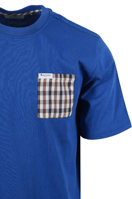 Aquascutum Club Check Pocket T-shirt in Royal Blue
Elevate your casual wardrobe with the Aquascutum Club Check Pocket T-shirt in Royal Blue. This classic crew neck tee offers a refined touch with its iconic Club Check patch pocket, a signature detail from the esteemed British brand.
 
 Crafted from premium, 100% organic jersey cotton, this short-sleeved t-shirt provides exceptional comfort and breathability for everyday wear. A subtle Aquascutum brand tab adds a discreet mark of quality. Perfect for layering or wearing on its own, this Royal Blue tee is a versatile staple that embodies understated luxury. 

 
Features

Iconic Club Check Pocket: A signature touch showcasing Aquascutum's heritage.
Premium Organic Cotton: Made from 100% organic cotton for superior comfort and a sustainable choice.   
Classic Crew Neck: A timeless design that pairs effortlessly with any outfit.
Short Sleeves: Ideal for warm weather or layering.
Aquascutum Brand Tab: Discreet branding for a touch of authenticity.
Soft Jersey Fabric: Provides a comfortable and relaxed fit.
Style code: AA_B005_TS007