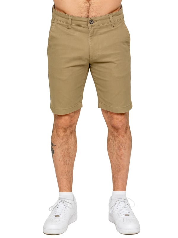Upgrade your warm-weather wardrobe with the Enzo Men's Chino Shorts, designed for both style and comfort. Featuring a slim fit and crafted from stretch fabric, these shorts offer ease of movement and a sleek look. Practicality meets sophistication with two side slash pockets and two back welt pockets, providing ample storage for your essentials. The zip fly fastening ensures a secure and classic finish. (647)