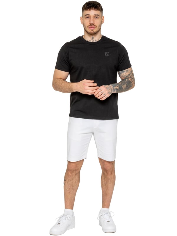 Upgrade your warm-weather wardrobe with the Enzo Men's Chino Shorts, designed for both style and comfort. Featuring a slim fit and crafted from stretch fabric, these shorts offer ease of movement and a sleek look. Practicality meets sophistication with two side slash pockets and two back welt pockets, providing ample storage for your essentials. The zip fly fastening ensures a secure and classic finish. (647)