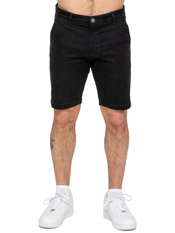 Upgrade your warm-weather wardrobe with the Enzo Men's Chino Shorts, designed for both style and comfort. Featuring a slim fit and crafted from stretch fabric, these shorts offer ease of movement and a sleek look. Practicality meets sophistication with two side slash pockets and two back welt pockets, providing ample storage for your essentials. The zip fly fastening ensures a secure and classic finish. (647)