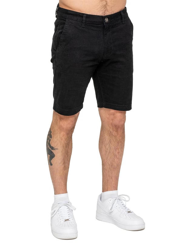Upgrade your warm-weather wardrobe with the Enzo Men's Chino Shorts, designed for both style and comfort. Featuring a slim fit and crafted from stretch fabric, these shorts offer ease of movement and a sleek look. Practicality meets sophistication with two side slash pockets and two back welt pockets, providing ample storage for your essentials. The zip fly fastening ensures a secure and classic finish. (647)
