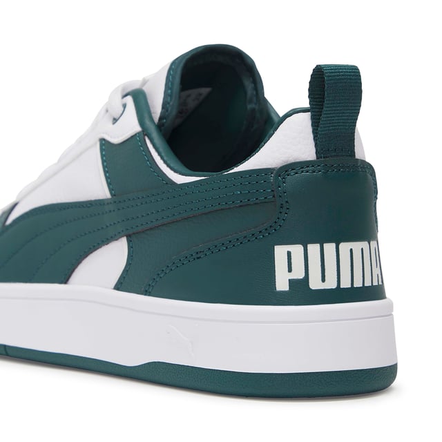 PRODUCT STORY: Sport-inspired shoes for life on the go. The PUMA Dribble SD sneakers blend sleek style and everyday comfort so you can focus on the important things. DETAILS: Regular fit; Mid boot; Rubber outsole; Lace closure; PUMA branding details.
