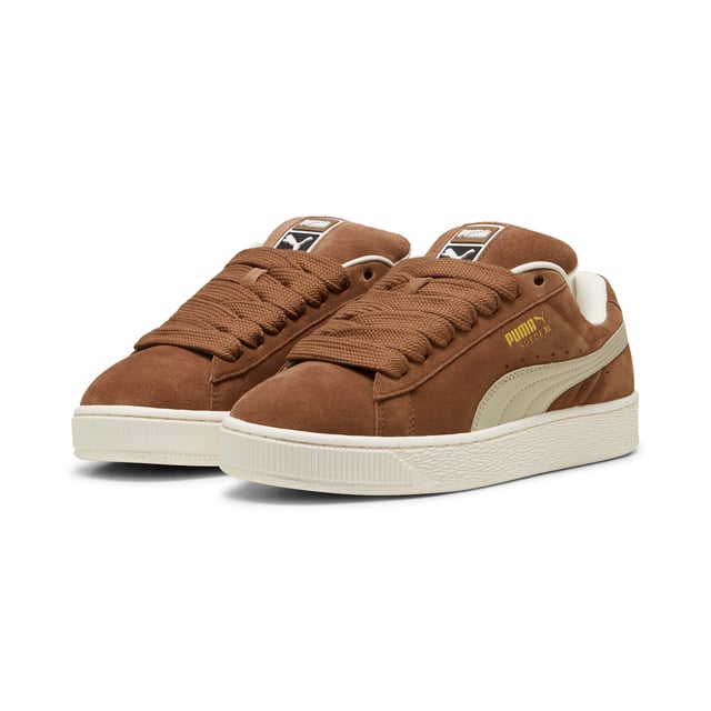 PUMA Unisex Suede XL Sneakers PRODUCT STORY: This fresh take on the classic Suede draws inspiration from PUMA’s heritage within breakdancing and its influence on modern streetwear. The Suede XL retains the Suede’s iconic DNA, but gives it a twist with an exaggerated padded collar and tongue, plus a chunkier sole. This execution features a full suede upper with a leather Formstrip. FEATURES & BENEFITS: PUMA’s leather products support responsible manufacturing via the Leather Working Group.DETAILS: Suede upper; Leather Formstrip; Suede tongue with mesh binding; Debossed and foil-printed PUMA branding on quarter panel; Mesh lining; Mesh sockliner; Rubber midsole; Rubber outsole; Lining: Textile, Other; Outsole: Rubber; Upper: Leather; Sockliner: Textile.
