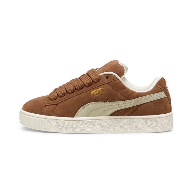 PUMA Unisex Suede XL Sneakers PRODUCT STORY: This fresh take on the classic Suede draws inspiration from PUMA’s heritage within breakdancing and its influence on modern streetwear. The Suede XL retains the Suede’s iconic DNA, but gives it a twist with an exaggerated padded collar and tongue, plus a chunkier sole. This execution features a full suede upper with a leather Formstrip. FEATURES & BENEFITS: PUMA’s leather products support responsible manufacturing via the Leather Working Group.DETAILS: Suede upper; Leather Formstrip; Suede tongue with mesh binding; Debossed and foil-printed PUMA branding on quarter panel; Mesh lining; Mesh sockliner; Rubber midsole; Rubber outsole; Lining: Textile, Other; Outsole: Rubber; Upper: Leather; Sockliner: Textile.