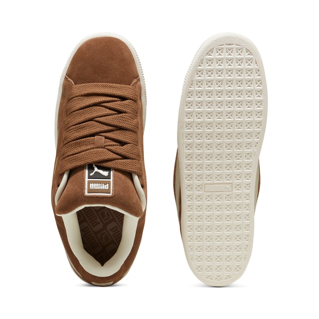 PUMA Unisex Suede XL Sneakers PRODUCT STORY: This fresh take on the classic Suede draws inspiration from PUMA’s heritage within breakdancing and its influence on modern streetwear. The Suede XL retains the Suede’s iconic DNA, but gives it a twist with an exaggerated padded collar and tongue, plus a chunkier sole. This execution features a full suede upper with a leather Formstrip. FEATURES & BENEFITS: PUMA’s leather products support responsible manufacturing via the Leather Working Group.DETAILS: Suede upper; Leather Formstrip; Suede tongue with mesh binding; Debossed and foil-printed PUMA branding on quarter panel; Mesh lining; Mesh sockliner; Rubber midsole; Rubber outsole; Lining: Textile, Other; Outsole: Rubber; Upper: Leather; Sockliner: Textile.