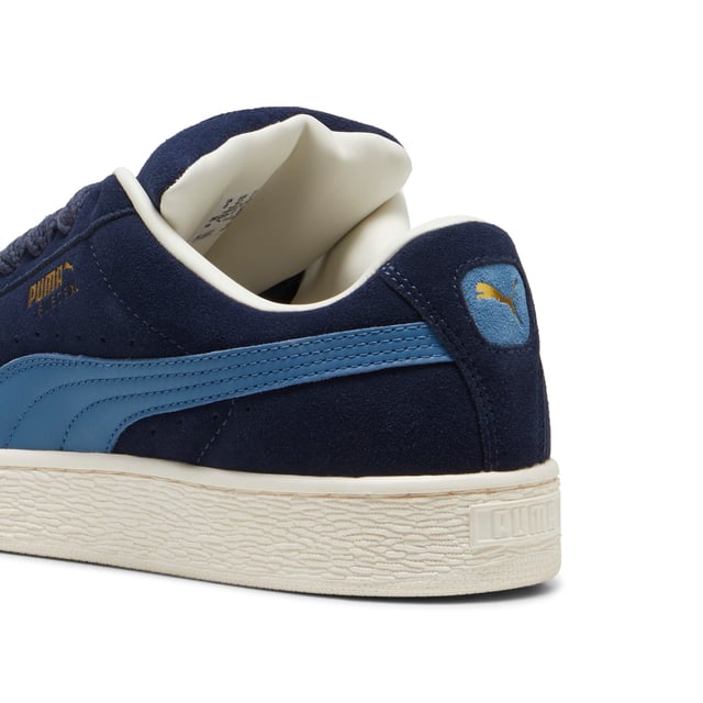 PRODUCT STORY: This fresh take on the classic Suede draws inspiration from PUMA’s heritage within breakdancing and its influence on modern streetwear. The Suede XL retains the Suede’s iconic DNA, but gives it a twist with an exaggerated padded collar and tongue, plus a chunkier sole. This execution features a full suede upper with a leather Formstrip. FEATURES & BENEFITS: PUMA’s leather products support responsible manufacturing via the Leather Working Group.DETAILS: Suede upper; Leather Formstrip; Suede tongue with mesh binding; Debossed and foil-printed PUMA branding on quarter panel; Mesh lining; Mesh sockliner; Rubber midsole; Rubber outsole; Lining: Textile, Other; Outsole: Rubber; Upper: Leather; Sockliner: Textile.