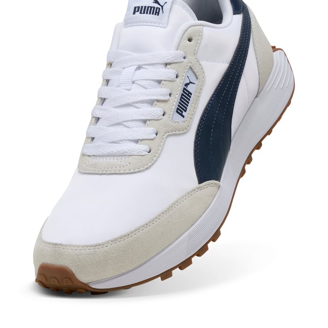 PRODUCT STORY: The Runtamed Lugged sneaker is designed for our trendsetters. Featuring rich details, the overall design remains functional and athletic. With its versatile and durable construction, the RunTamed sneaker is a reliable choice for any adventure. FEATURES & BENEFITS: The upper of the shoes is made with at least 20% recycled materials and the bottom is made with at least 10% recycled materials.; SOFTFOAM+: Step-in comfort sockliner designed to provide soft cushioning thanks to its extra thick heel. DETAILS: Regular fit; Laces; Textile upper; Rubber outsole; PUMA branding.