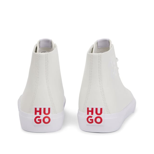 Men's Hugo Dyer Hi-Top Trainers in White HUGO sneaker. Lace up construction. Full leather high top upper design with logo in contrasting colour on the side. HUGO red patch enriches the backtab. Full vulcanized sole.
