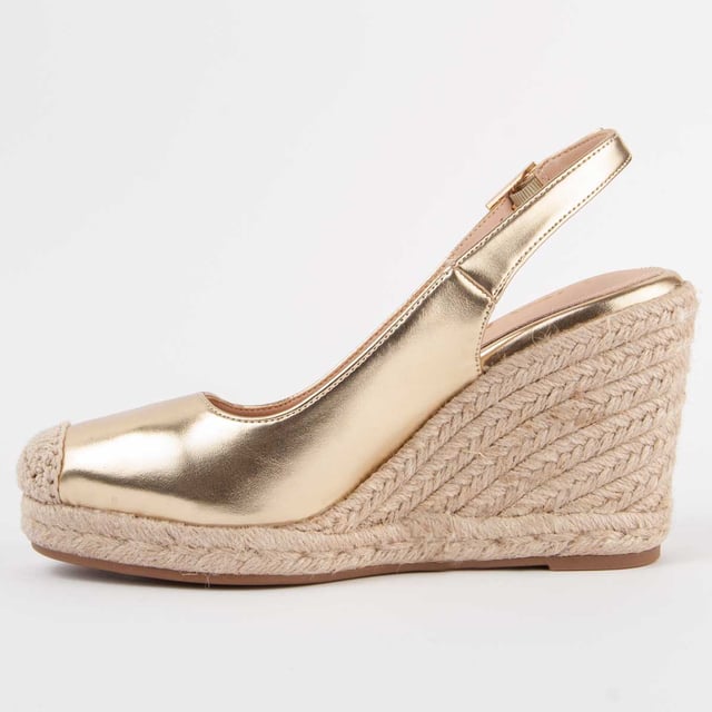 Dames sleehak espadrille. Binnenzool van 100% natuurlijk leer. Comfortabele pasvorm. Gemaakt door andere merken voor ons merk. Geschatte afmetingen: 8 cm hak en 2 cm plateau.