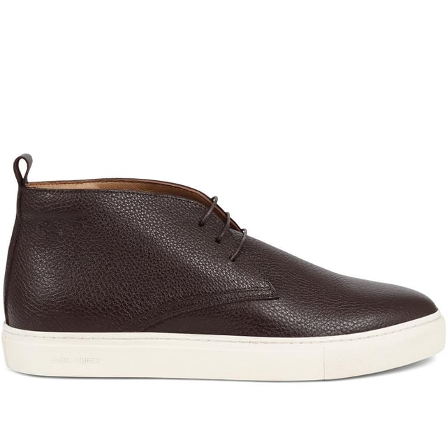 Chukka boots started out as a practical option for soldiers in the desert, these days the chukka fulfils the demands of every off-duty pursuit. Lightweight and equipped with a hardy Italian rubber sole, Sullivan features a high-cut profile crafted with supple suede, showcasing a traditional three eye-let lace-up and full leather linings, comfortable and versatile enough to serve you from work to weekend.

We recommend if you are between sizes to select the smaller than your usual.